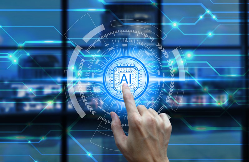 AI consulting: hand selecting an AI interface on a digital display
